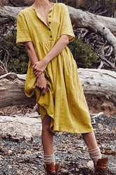 Vestido midi liso con cuello redondo y botones